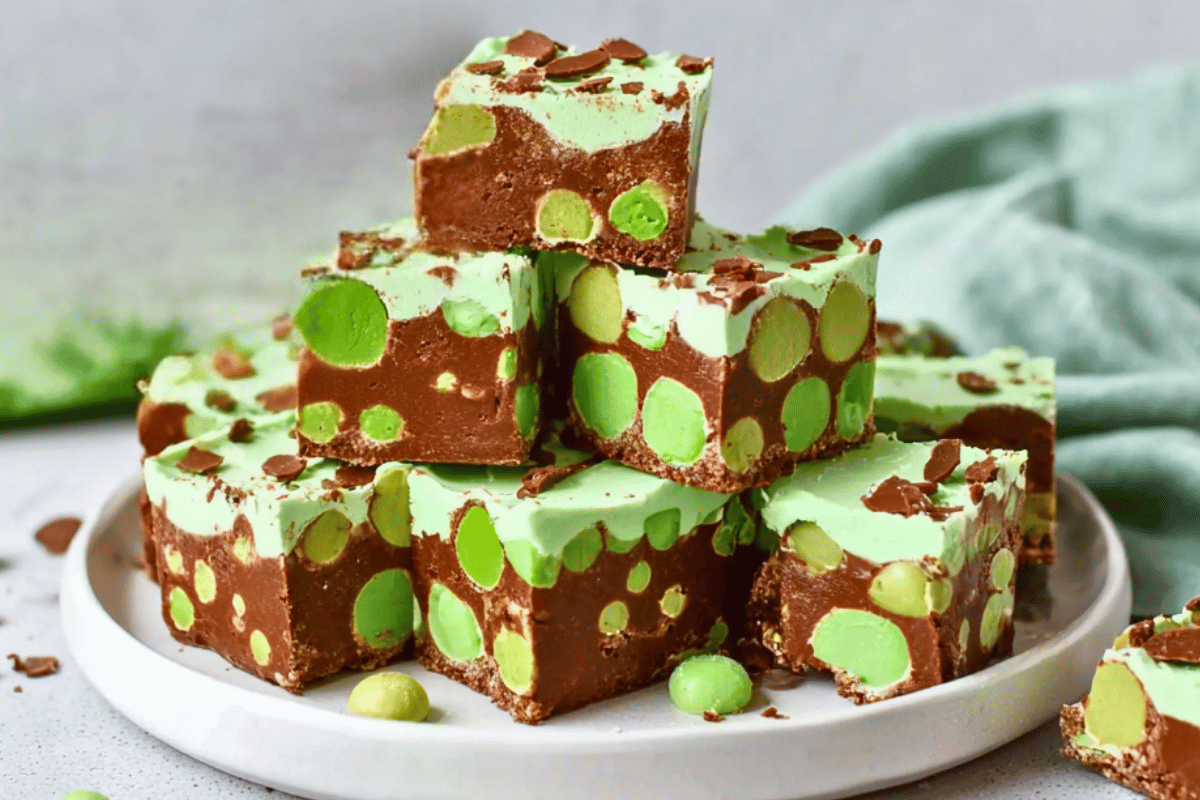Slices of No-Bake Mint Aero Traybake with visible mint chocolate pieces