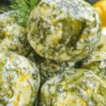 Dill Pickle Cheese Ball with fresh dill and cheddar coating